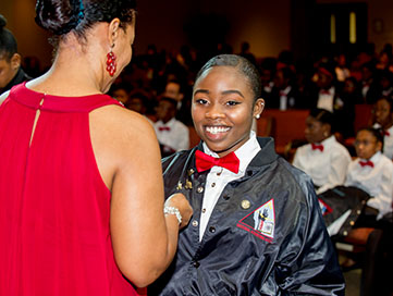 Youth receiving an award. 